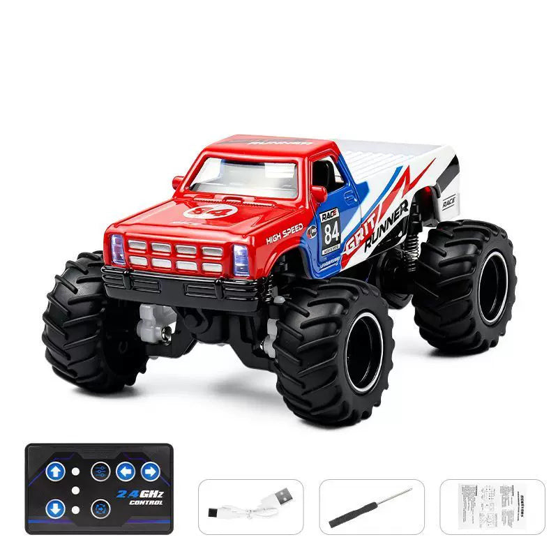 1:64 Classic Mini RC Monster Pickup: Red Blue 84 GRIT RUNNER selected vehicle with blue-button card remote, charging cable, screwdriver and manual