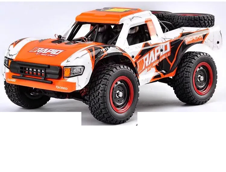Orange RAPID Q130B vehicle body, three-quarter view; selected battery and shock package are listed separately
