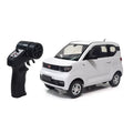 Mini EV RC City Car - Standard and Graphic Packages: White Mini EV RC city car and pistol-style controller