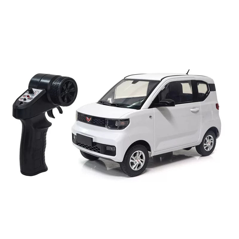 Mini EV RC City Car - Standard and Graphic Packages: White Mini EV RC city car and pistol-style controller