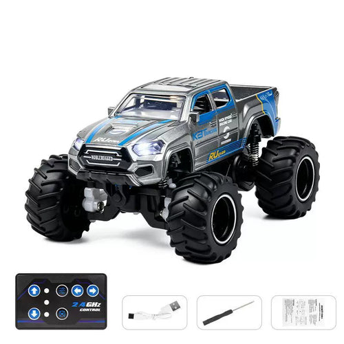 1:64 Modern Mini RC Monster Pickup: Silver Blue K3T selected vehicle with blue-button card remote, charging cable, screwdriver and manual