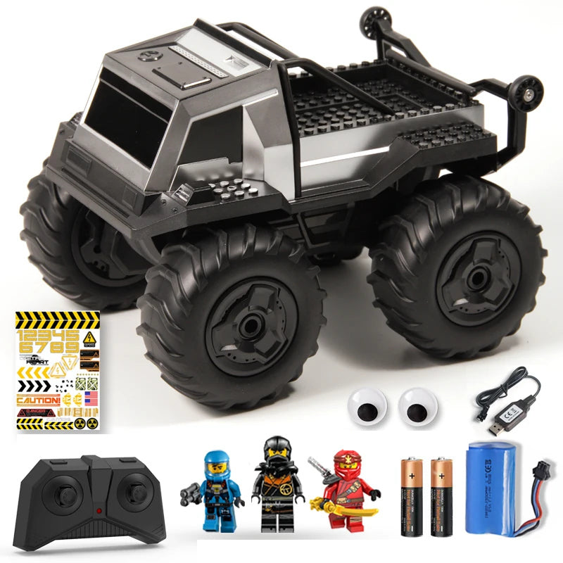 Small Silver RC Pickup with Figure Accessories: Exact silver RC body with its controller, battery, USB cable and source gift accessories.