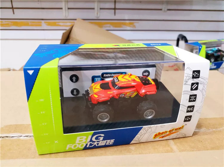 8024 Mini RC Monster Truck - Color Selection: Red 8024 RC truck and controller in its own retail packaging