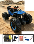 Blue or Green Knobby-Wheel RC Crawler: Blue crawler, its exact controller and specified kit.