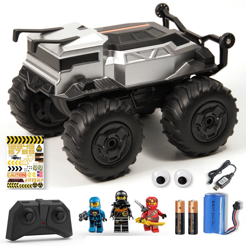 Small Silver RC Car with Figure Accessories: Exact silver RC body with its controller, battery, USB cable and source gift accessories.