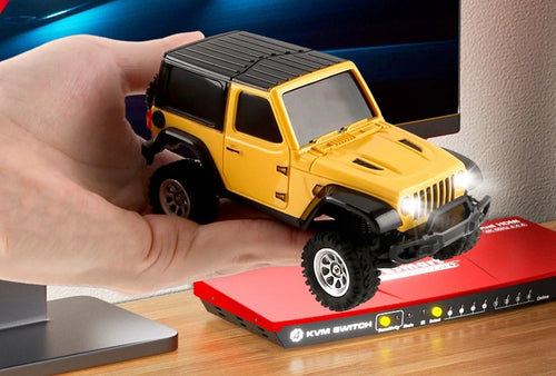 Yellow 1:36 RC SUV held in a hand