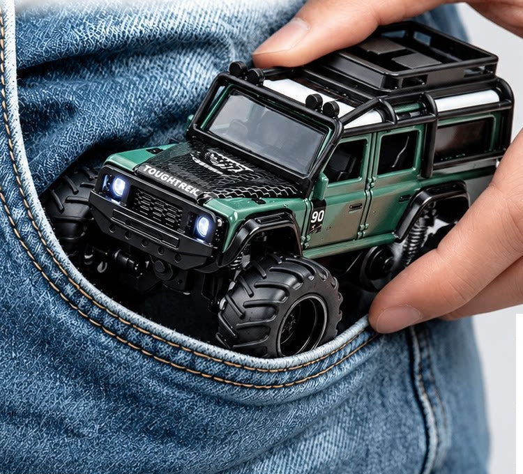 Green Defender-style mini RC SUV shown against a pocket