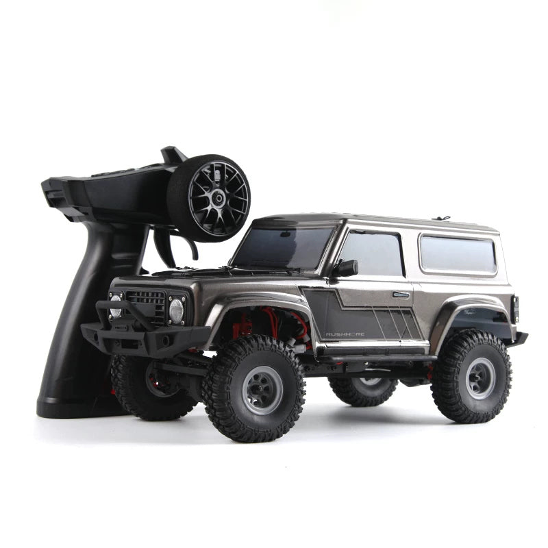 D1RC 1:18 Short-Body RC SUV: Gray D1RC 1:18 Short-Body RC SUV with its pictured handheld controller; power accessories not depicted