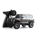 D1RC 1:18 Short-Body RC SUV: Gray D1RC 1:18 Short-Body RC SUV with its pictured handheld controller; power accessories not depicted