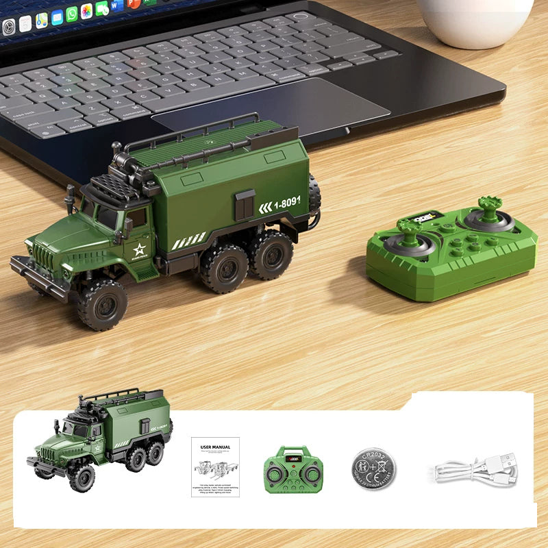 Green mini truck, matching handheld controller and listed accessories.