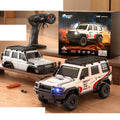 HB R43 1:43 Mini RC Crawler SUV Series: R4301 / White 74-Graphic SUV with one handheld controller and one spare white body shell; one complete vehicle supplied