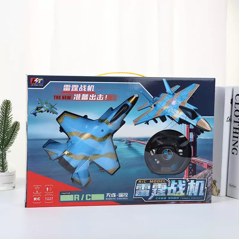 Blue jet-shaped ground toy and round controller in the original retail box.