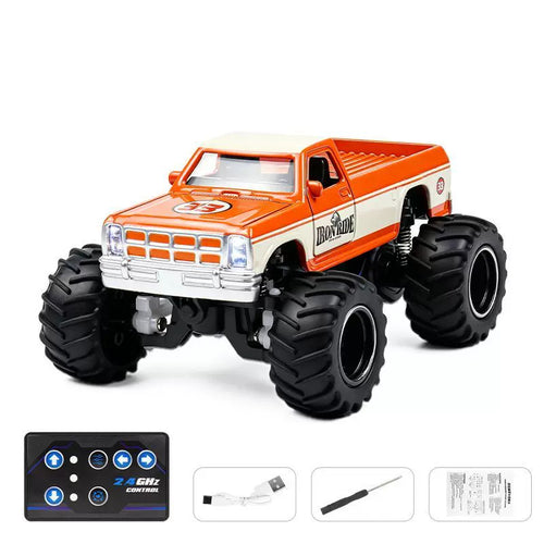 1:64 Classic Mini RC Monster Pickup: Orange Cream 33 IRON RIDE selected vehicle with blue-button card remote, charging cable, screwdriver and manual