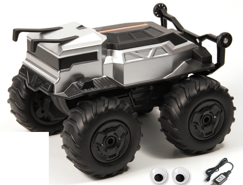 Small Silver RC Car with Figure Accessories: Cab and wheel/body details of the same small silver RC vehicle.