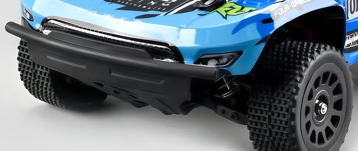Q130C front bumper and wheel tread detail from the same source image; not a new camera angle