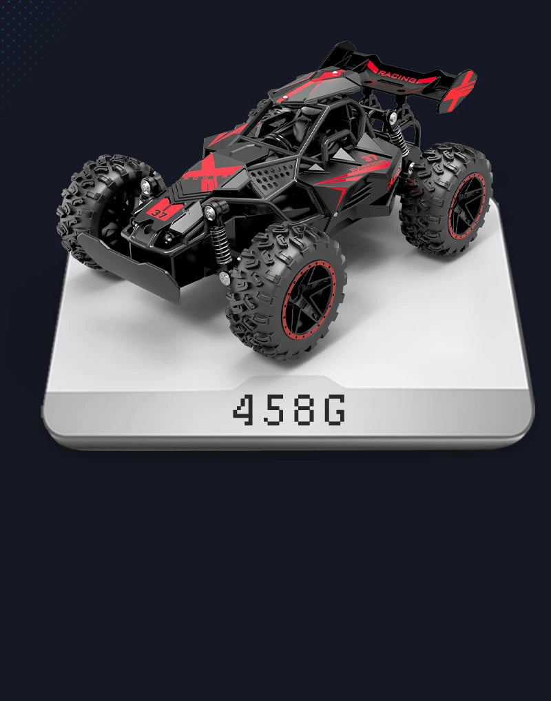 Red and black RC buggy displayed on a weighing scale; scale not included