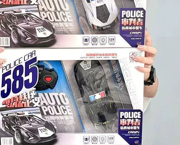 Black police-style body and its controller through the lower source retail window.