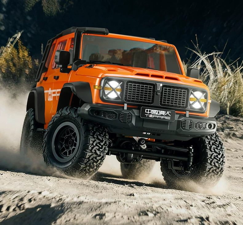 Front body and wheels of the orange MN300 RC crawler