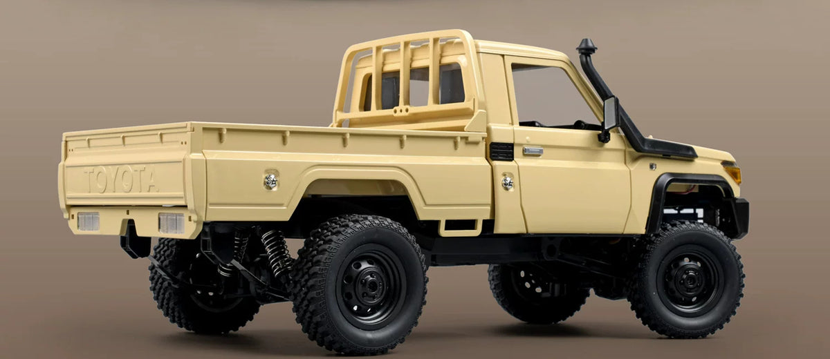 Yellow MN82 RC pickup rear side and cargo bed
