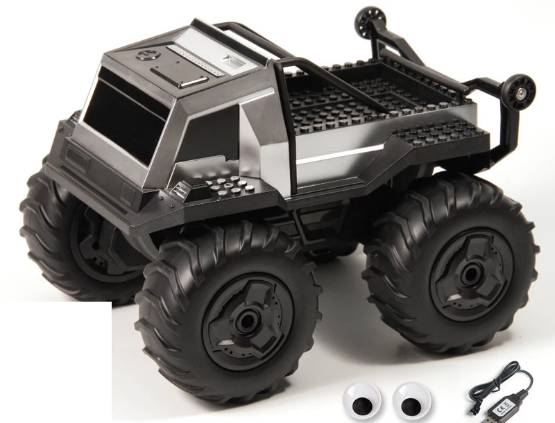 Small Silver RC Pickup with Figure Accessories: Cab and wheel/body details of the same small silver RC vehicle.