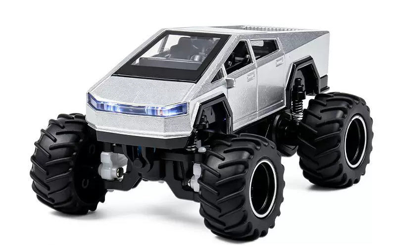Silver detailed-cab RC monster pickup with dark rims