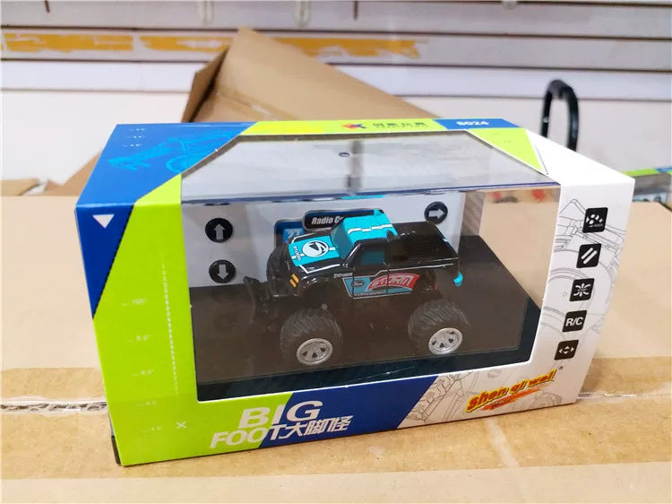 8024 Mini RC Monster Truck - Color Selection: Sky Blue 8024 RC truck and controller in its own retail packaging