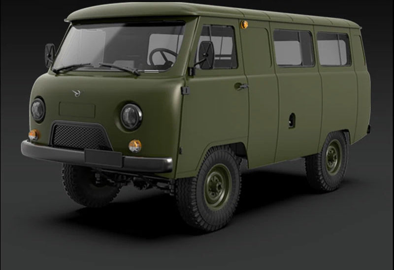 Green C104 van body and wheels from the opposite front corner.