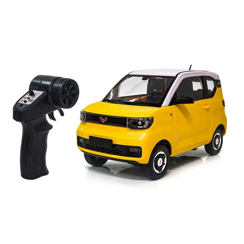 Mini EV RC City Car - Standard and Graphic Packages: Yellow Mini EV RC city car and pistol-style controller
