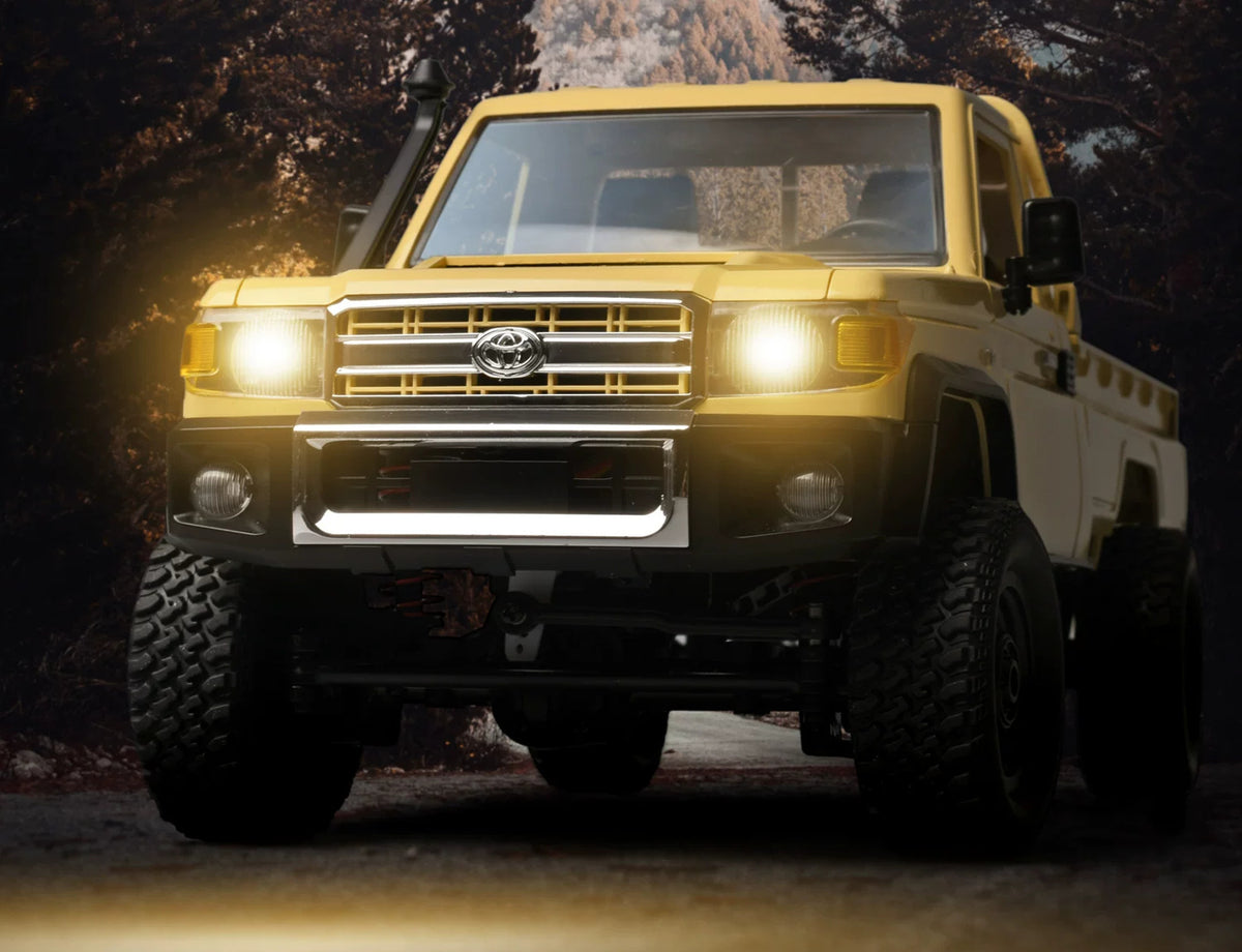 MN82 yellow pickup front grille and illuminated headlights