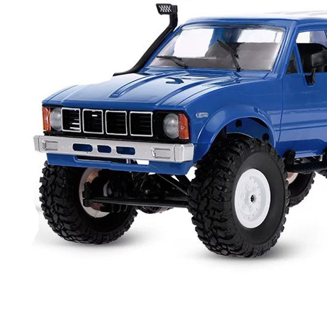 Blue pickup front grille,bumper andfront wheel detail