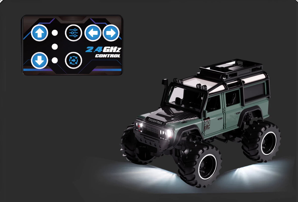 Green Defender-style RC SUV beside its mini card remote