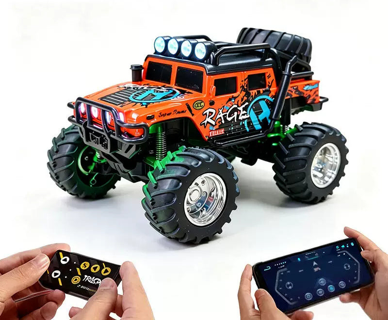 Orange RC truck with handheld remote and phone-control demonstration; phone is a prop