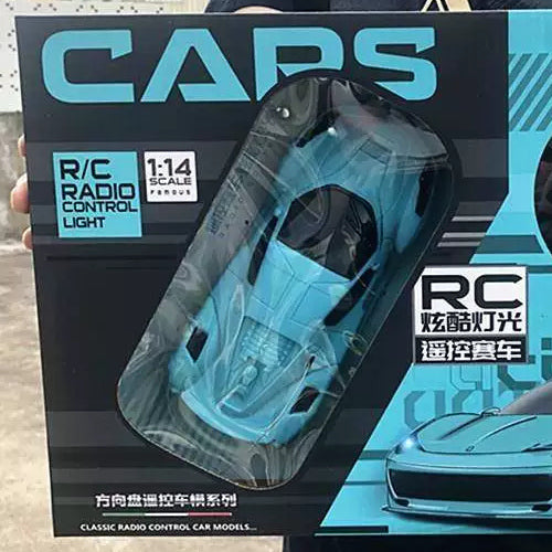 Body profile of the blue coupe through its retail window.
