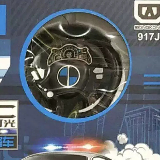 Wheel-style controller in the same top police-car retail kit.