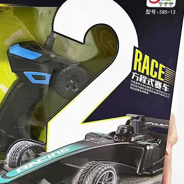 Pistol-style controller in the same formula-car retail package.