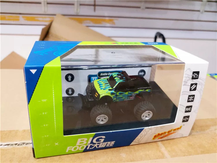 8024 Mini RC Monster Truck - Color Selection: Green 8024 RC truck and controller in its own retail packaging