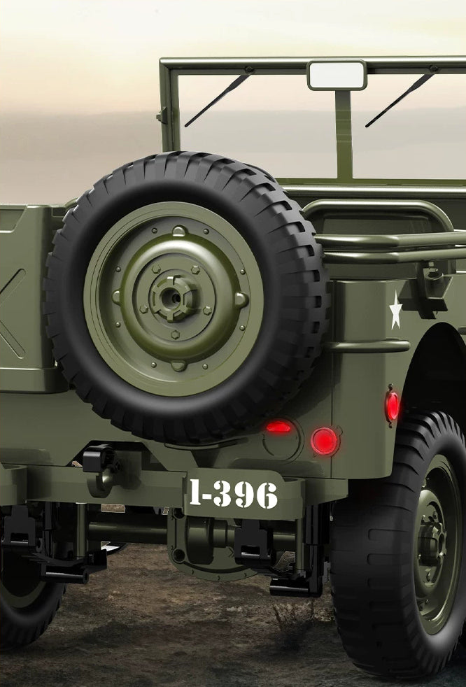 Rear-mounted spare wheel and rear lights on the military green RC Jeep