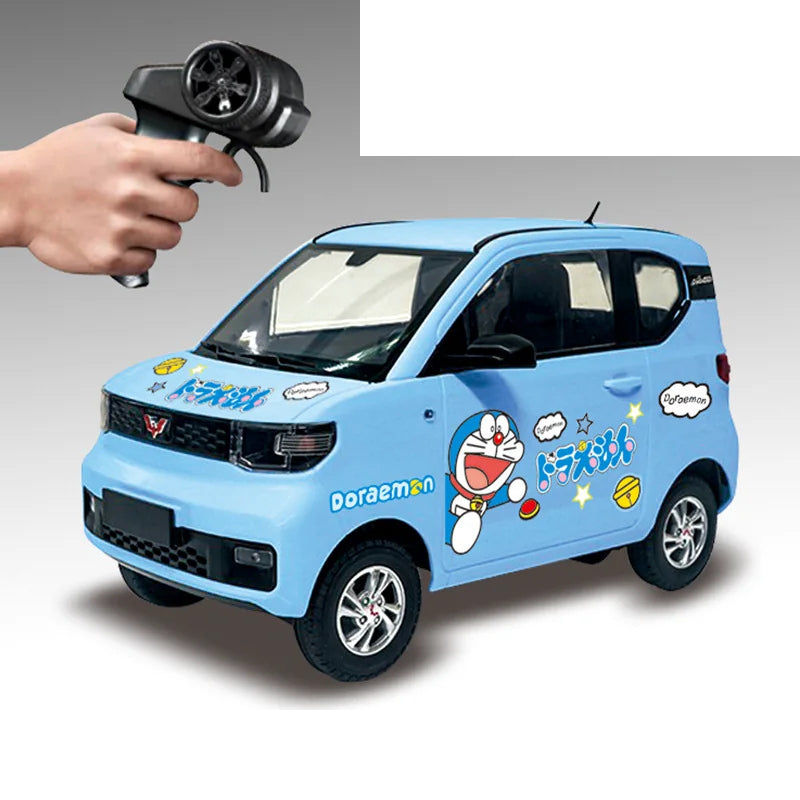 Mini EV RC City Car - Standard and Graphic Packages: Blue Mini EV RC city car with selected graphic body and pistol-style controller