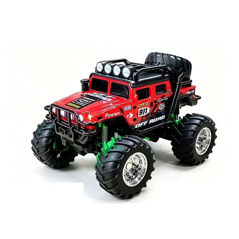 Red mini RAGE RC truck showing its body graphics and treaded tires