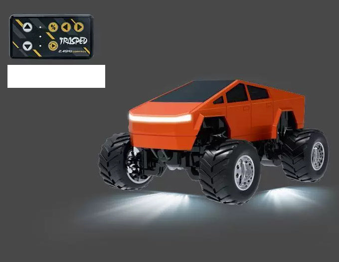 Orange smooth-cab RC monster pickup with chrome-finish wheel hubs and yellow-button card remote