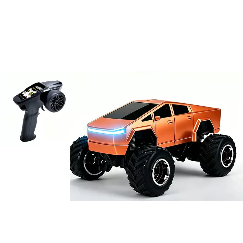 Orange angular RC truck beside its pistol-style remote controller